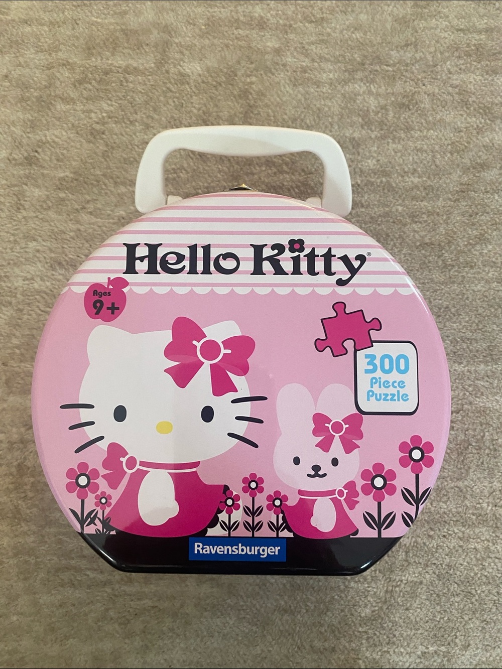 Hello Kitty Pink Puzzle Tin Purse with handle Sanrio. 300 piece 2009 licensed.